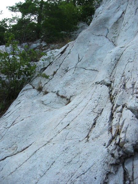 Partial pothole in the cliff