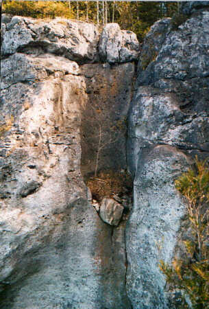Partial pothole in cliff